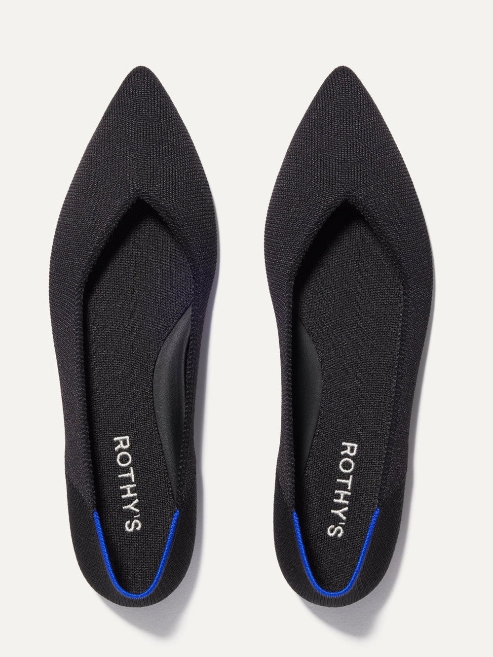 Rothy's Black Pointed Knit Flats with Blue Heel Trim